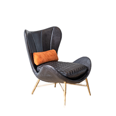 Eze Occasional Chair upholstered in top-grain leather with iron legs, modern minimalist design, and mid-century industrial style for living rooms or lounges