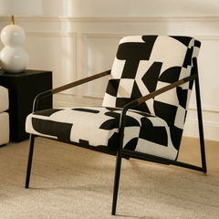 Elegant Oia fabric armchair with black and white upholstery and wooden frame
