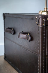 Felix coffee table styled as a leather storage chest, versatile furniture for modern apartments and classic homes
