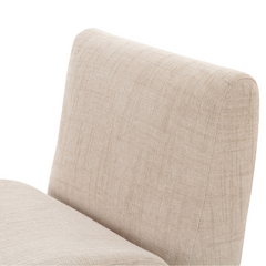 Fabric upholstered Jaya Armchair, unique accent chair for bedroom corner