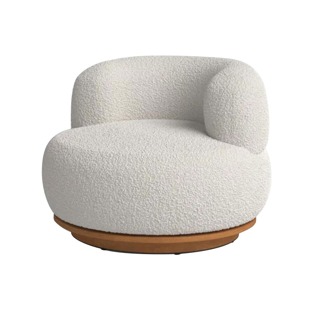 Kera Swivel Chair upholstered in high-quality fabric with rubber wood swivel base, modern and luxury design.
