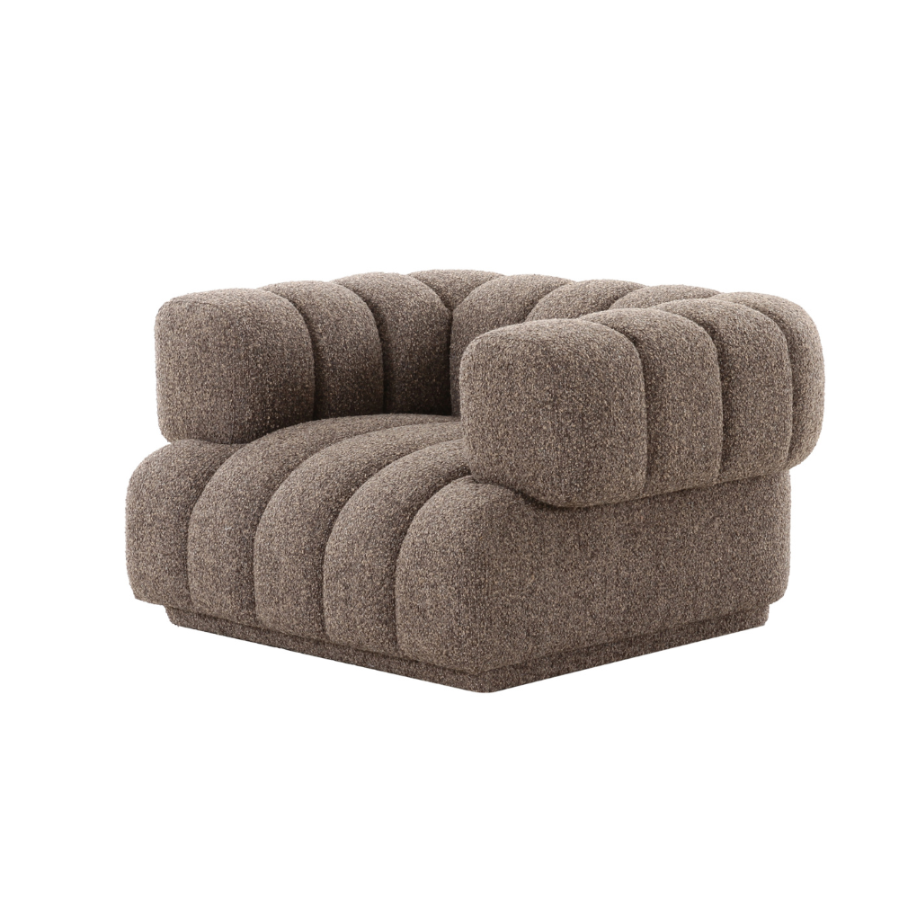 Lahti Armchair with cloud shape design, plush upholstery, and modern cozy style for living rooms and lounges.