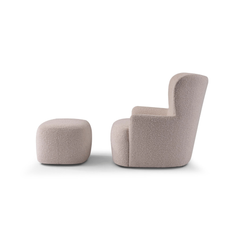 Lecce Boucl?? Ottoman paired with matching armchair, showcasing plush comfort, tactile fabric, and elegant modern style for Scandinavian-inspired spaces.