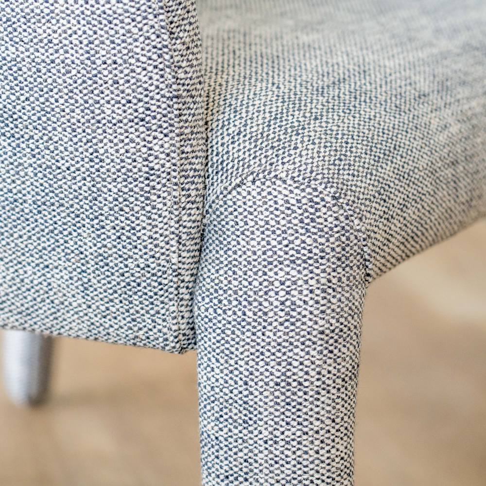 Lulea Armchair featuring low back and wide seat in cotton blend fabric, quality modern design for contemporary interiors.