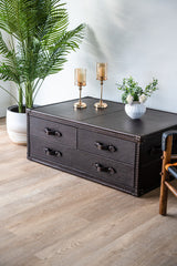 Luxury Felix coffee table in top grain leather, featuring spacious drawers and trunk-inspired design details