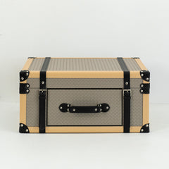 Three sizes of Milo PU leather storage boxes with front drawers and velvet lining arranged together in a stylish setting