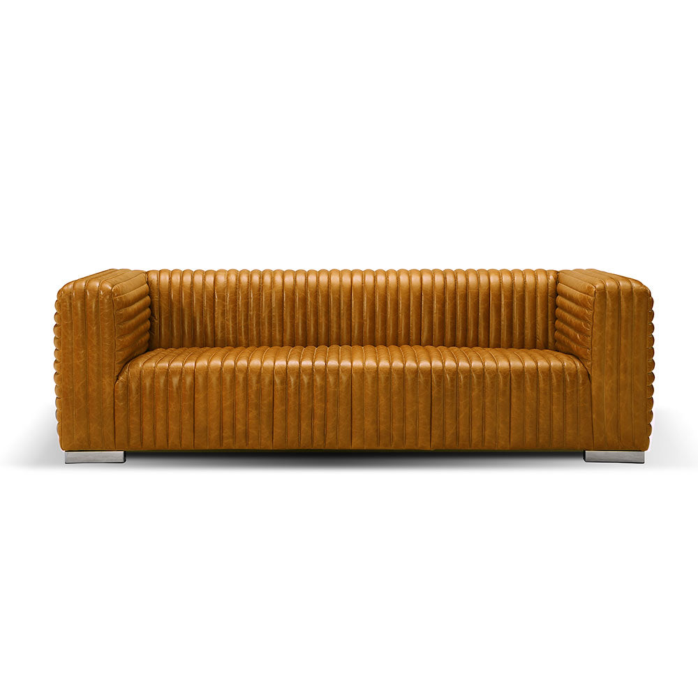 Modern channel-detailed sofa crafted from premium Brazilian top grain leather with sleek stitching, luxury designer living room furniture