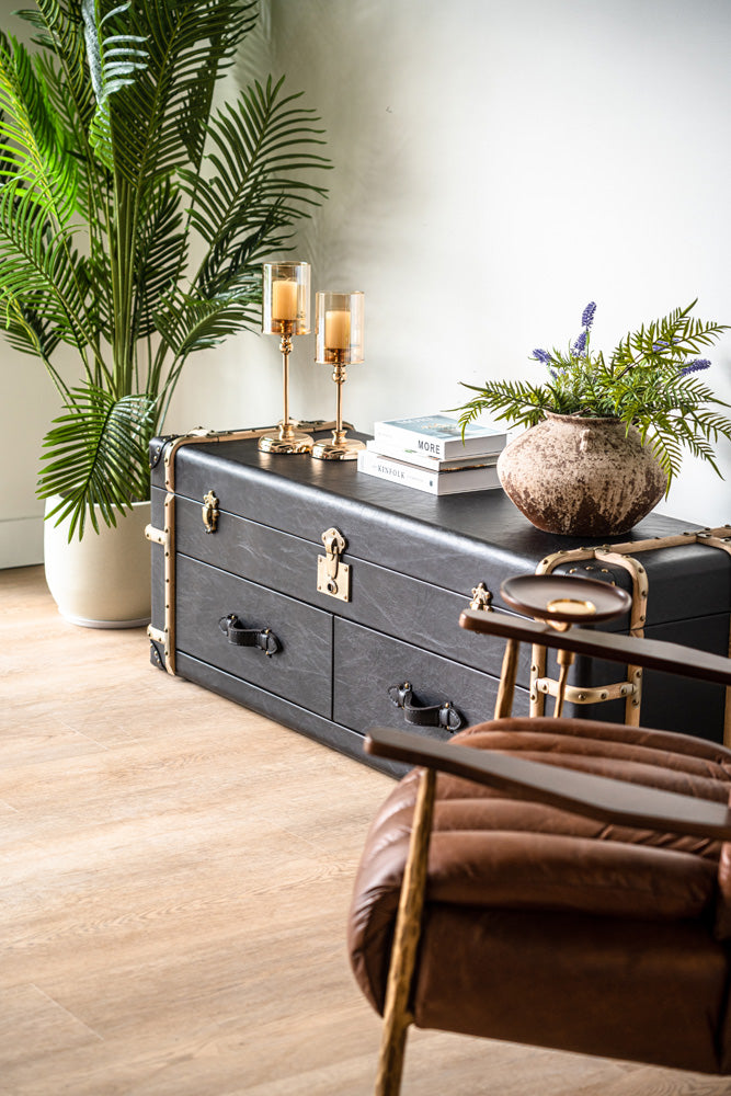 Modern Windsor trunk cabinet upholstered in leather, two-drawer design with versatile multi-use functionality