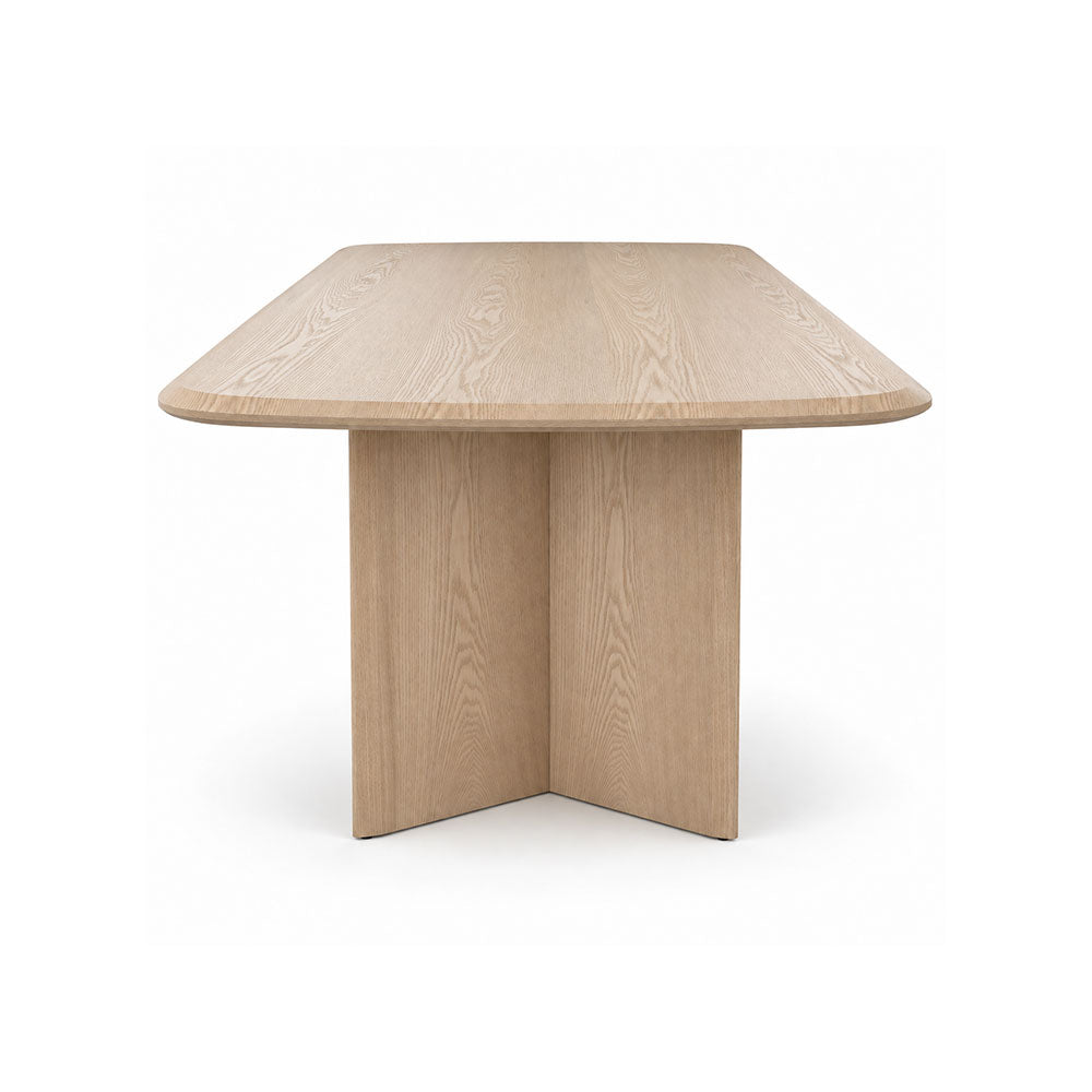 Modern Mora dining table in light wood with a simple minimalist design.