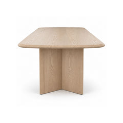 Modern Mora dining table in light wood with a simple minimalist design.