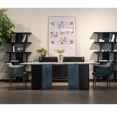 Motera luxury dining table with panda white stone top and grey titanium-plated stainless steel legs, seating 6 to 8 people in a modern dining space