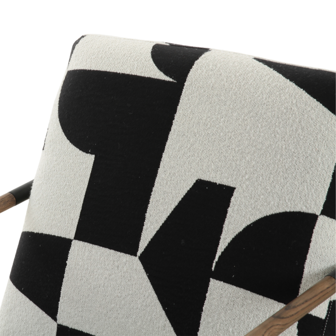 Stylish Oia fabric armchair in black and white, ideal for modern living rooms