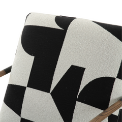 Stylish Oia fabric armchair in black and white, ideal for modern living rooms