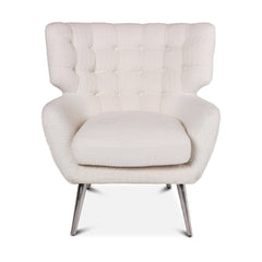 Pitea luxury boucle armchair with curved winged back, buttoning detail, sturdy steel legs, designer accent chair for modern living spaces