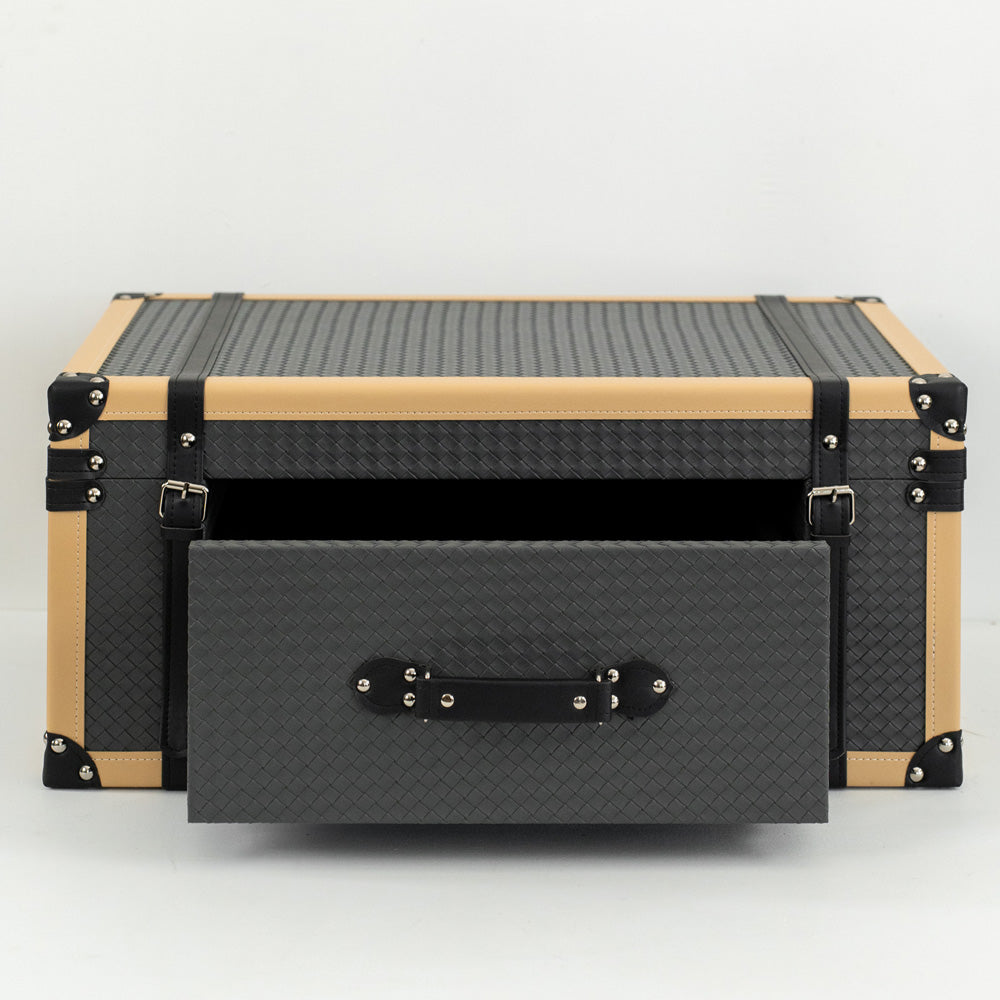 Renzo storage box with front drawer opened, holding jewelry and watches on a mid-century modern vanity