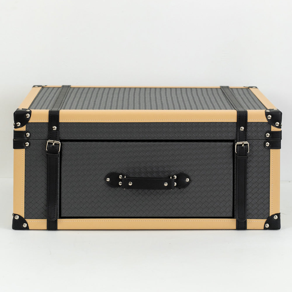 Close-up of Renzo PU leather storage box showing textured exterior, front drawer, and velvet-lined interior