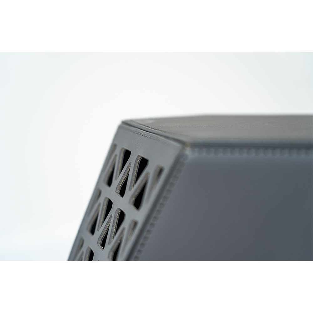 Close-up of the Seggio Stool showcasing its openwork carbon steel frame and saddle leather seat, highlighting modern craftsmanship