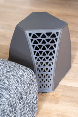 Side profile of the Seggio Stool emphasizing its minimalist silhouette and strong architectural form