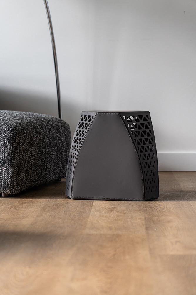 Detail shot of the Seggio Stool's premium saddle leather seat, offering a close look at its texture and craftsmanship
