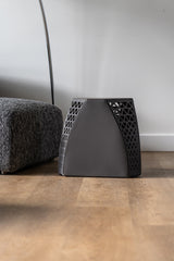 Detail shot of the Seggio Stool's premium saddle leather seat, offering a close look at its texture and craftsmanship