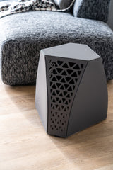 Seggio Stool styled in a minimalist interior, blending modern materials with versatile functionality