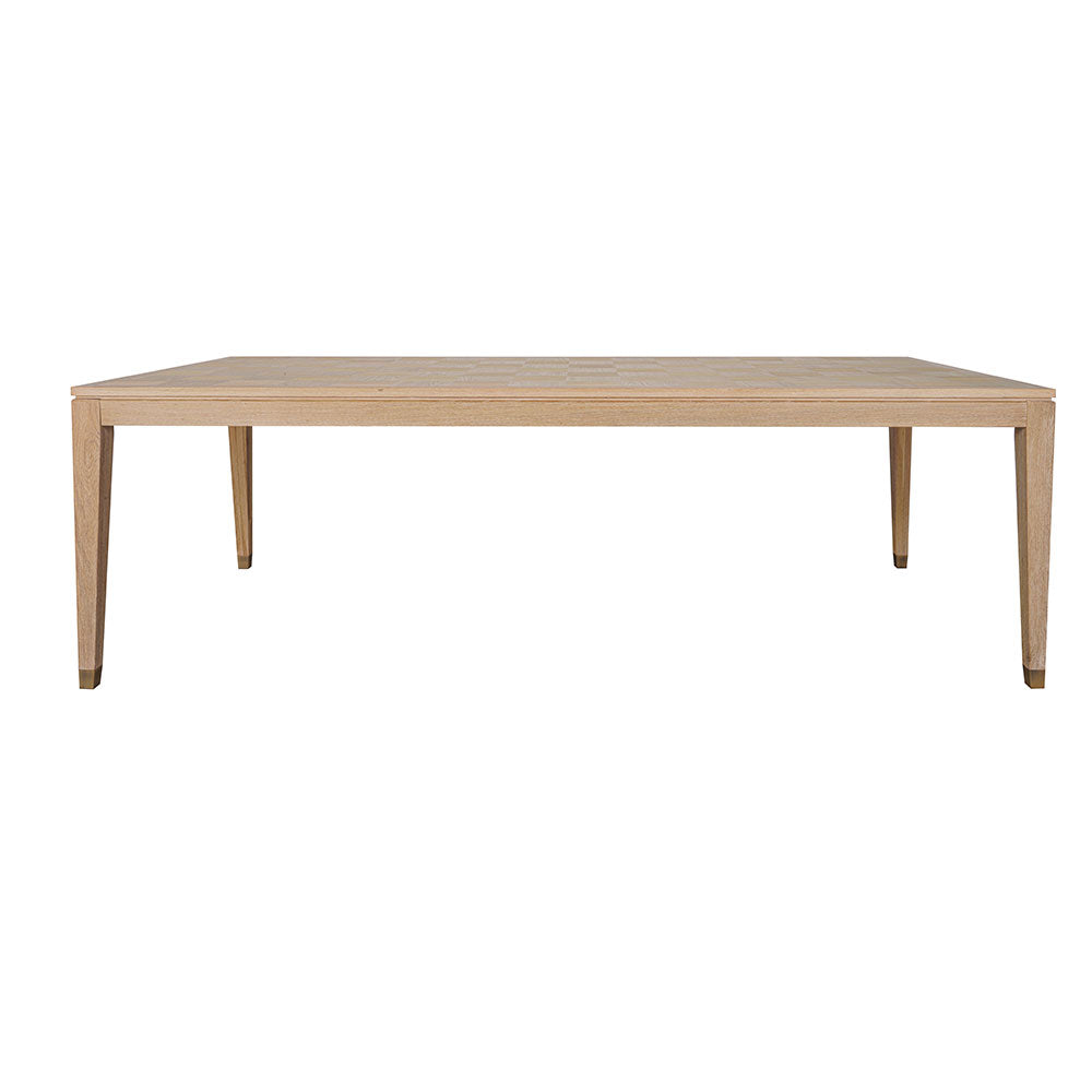 Sol dining table in a natural wood finish with a modern and timeless design