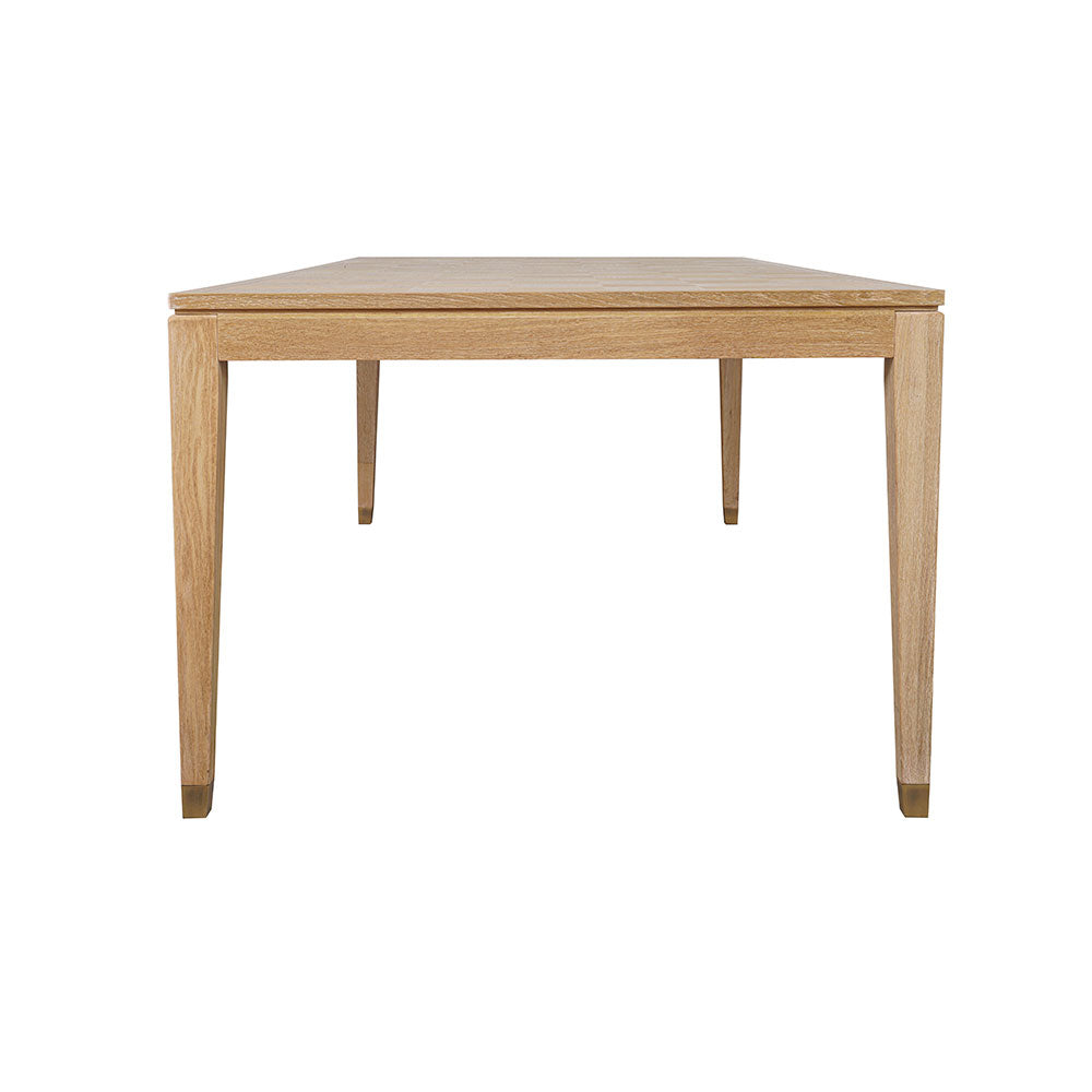 Close-up of the Sol dining table showing the natural oak veneer finish and wood grain