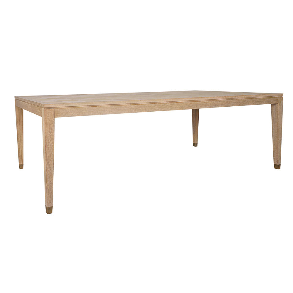 Sol natural wood dining table styled in a contemporary dining room