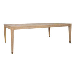 Sol natural wood dining table styled in a contemporary dining room