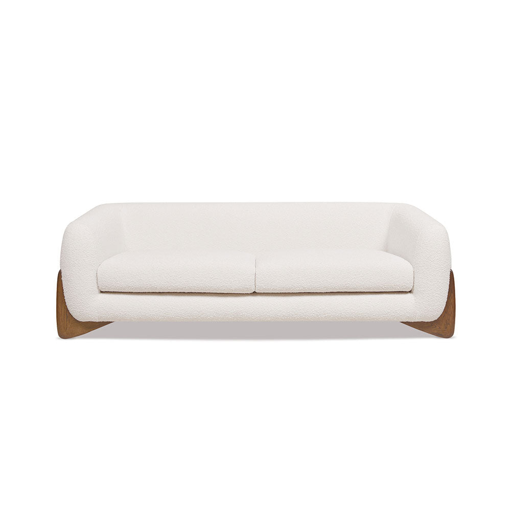 Tampere 2-Seater Sofa in boucle fabric with solid oak frame and carved wooden legs.
