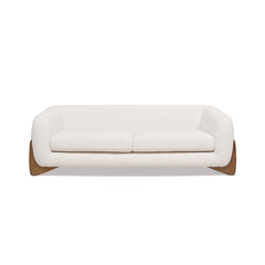 Tampere 2-Seater Sofa in boucle fabric with solid oak frame and carved wooden legs.