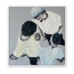 An abstract square painting depicting three figures in textured white, cream, black, and pale blue garments against a gray background, presented with a thin white frame.