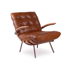 Tigma luxury armchair in premium top grain leather, distressed finish, slatted buckle back, hand-pleated and deep-buttoned detailing, sleek metal legs, designer accent chair.