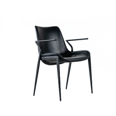 Turin Dining Chair with saddle leather seat and sleek metal frame, modern Scandinavian design, luxury dining chair for contemporary interiors.