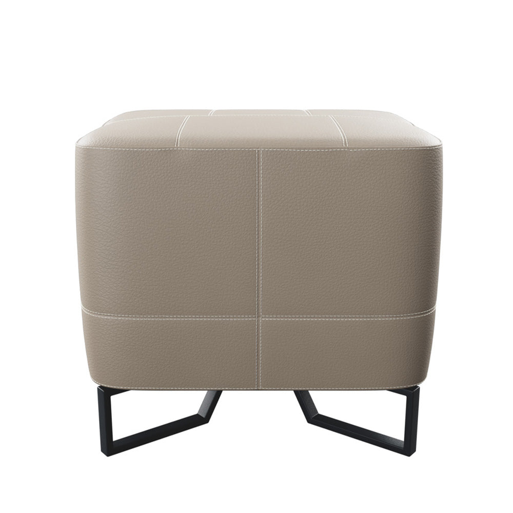 Verese Ottoman upholstered in premium imported Italian top-grain leather with high-density sponge for comfort, featuring brushed stainless steel legs, luxury modern ottoman for living rooms and bedrooms.
