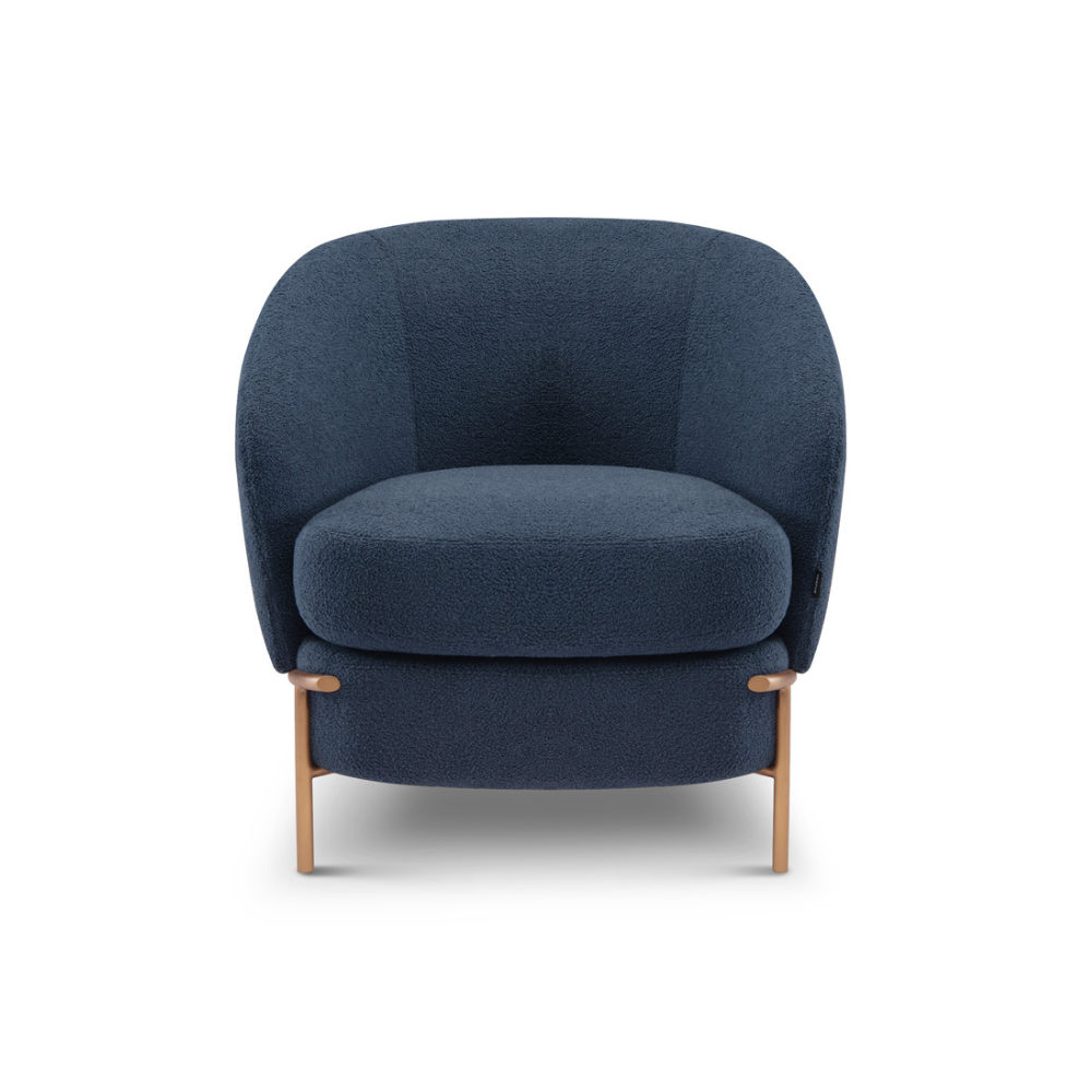 Vero Navy Bouclé Modern Accent Armchair with a sculptural barrel-shaped silhouette, deep seat, and brass-finished legs for a luxurious contemporary look.