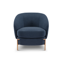Vero Navy Bouclé Modern Accent Armchair with a sculptural barrel-shaped silhouette, deep seat, and brass-finished legs for a luxurious contemporary look.
