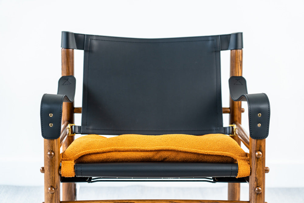 Yorkshire lounge accent chair in ashwood and leather with ergonomic proportions, modern home décor piece
